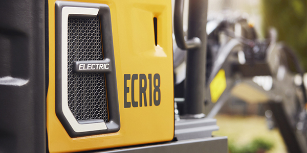 Close-up of Volvo ECR18 Electric excavator landscaping